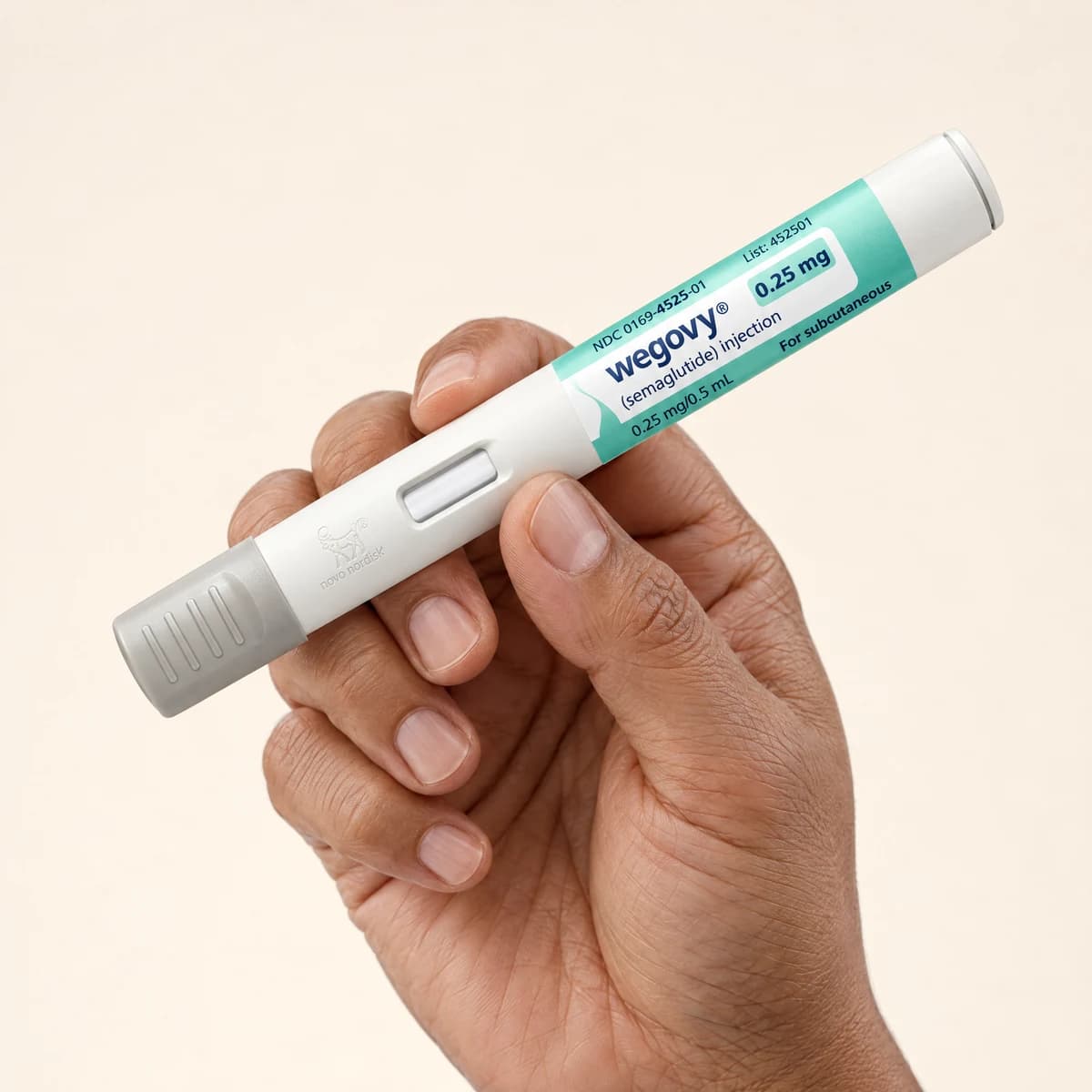 The once weekly Wegovy injection pen, held in one hand