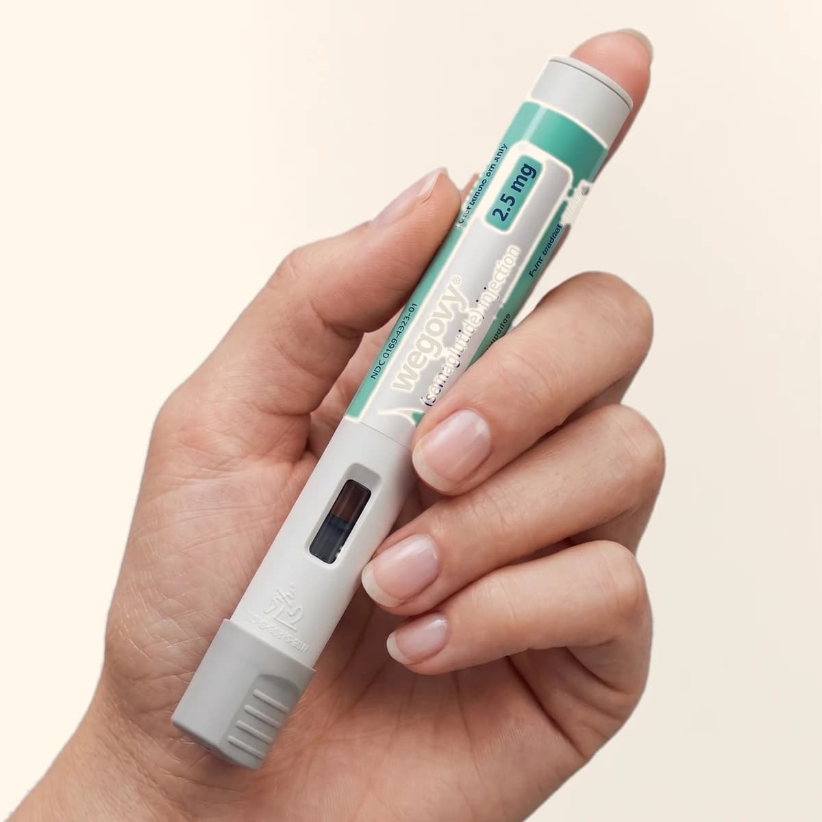 The once weekly Wegovy injection pen, held in one hand